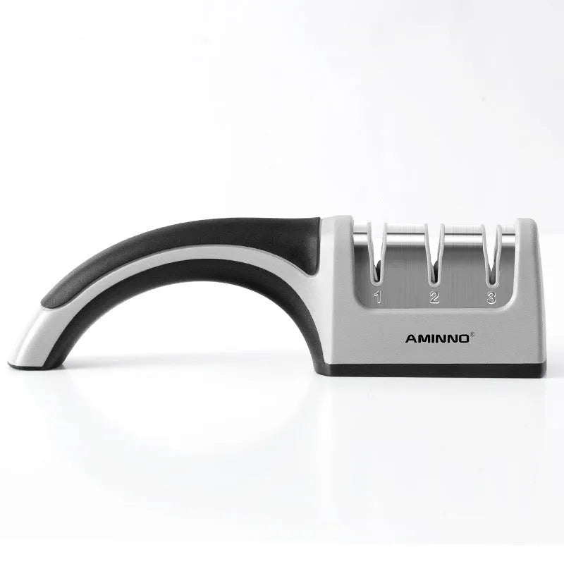 4-in-1 manual kitchen knife sharpener with black and cyan TPR handle, showing sharpening slots.