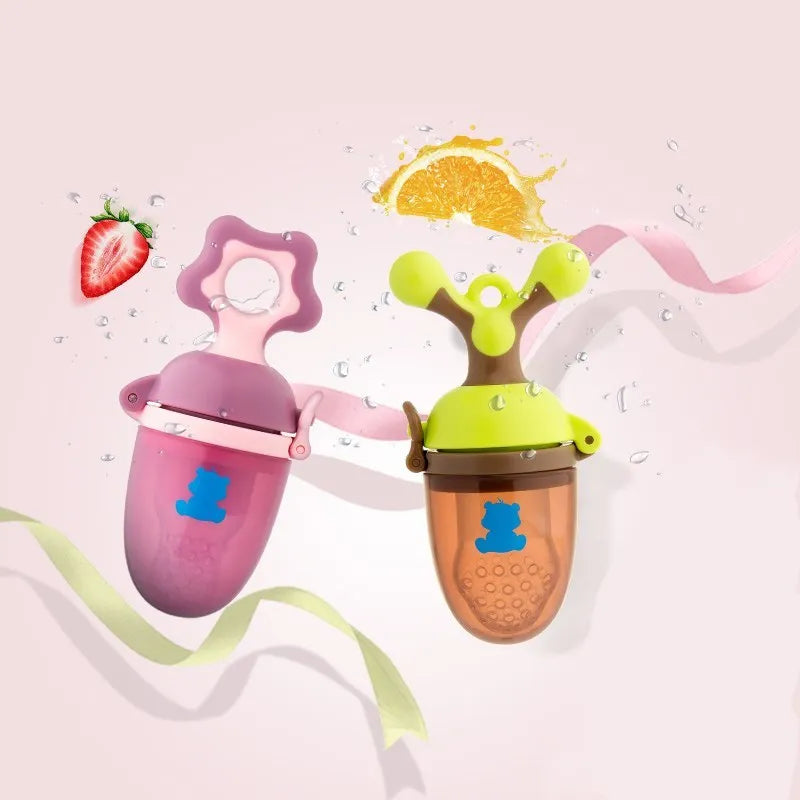 Green and purple polypropylene baby bite trainer with textured surface and easy-grip handle