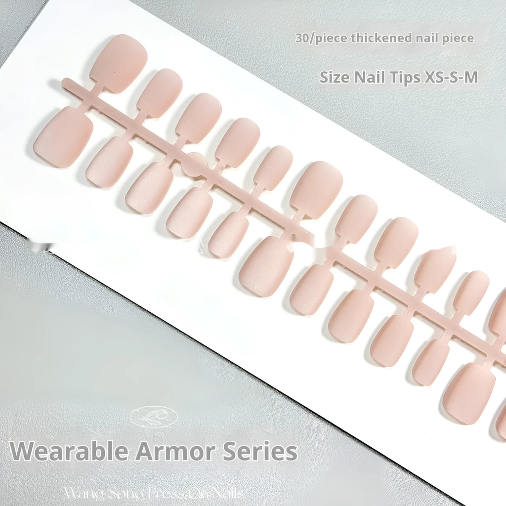 Set of false nails with frosted velvet finish and Cat's Eye designs in short ladder sizes XS, S, and M.