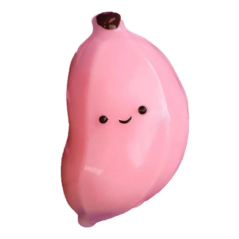 Chubby banana squeezing toy in pink TPR material for stress relief