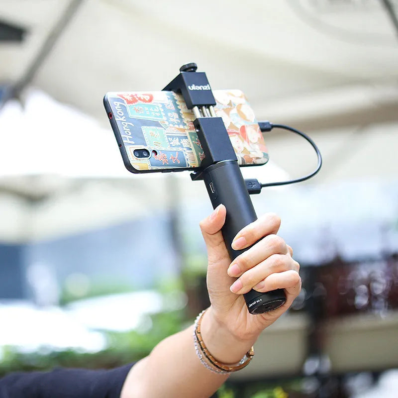 Black aluminium alloy portable power bank with integrated handle showing 12.5cm length