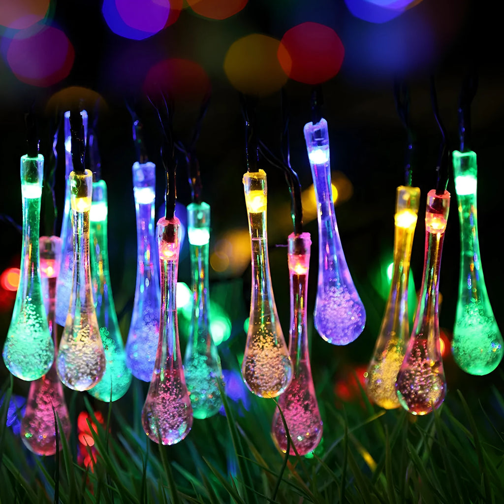 Solar-powered outdoor LED string lights with water drop pendants on 6.5m cable