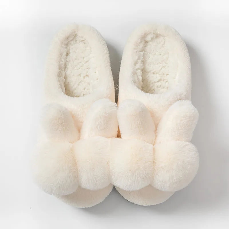 Women's fluffy rabbit fur slippers with floral pattern, high upper, and low heel in multiple colours.