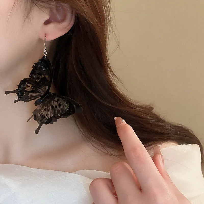 Dark style acrylic butterfly ear hook earrings for women with electroplated black finish