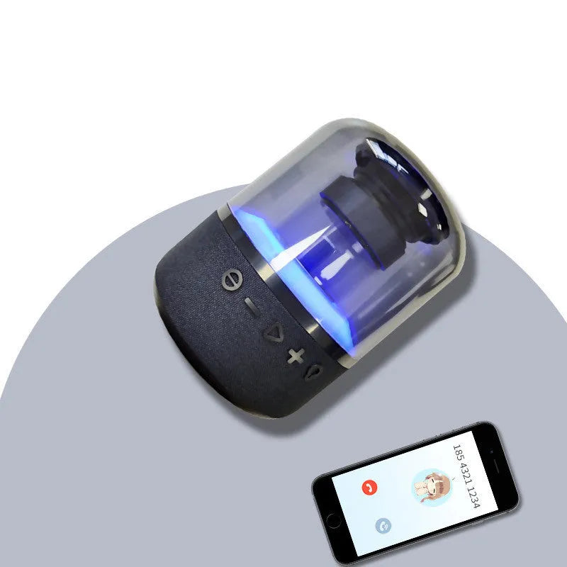 Black wireless Bluetooth speaker with touch controls and 360-degree sound projection