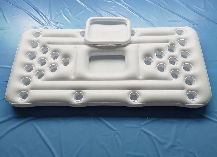 Inflatable beer pong buoy floating on pool water with cups set up on 24-hole blue surface