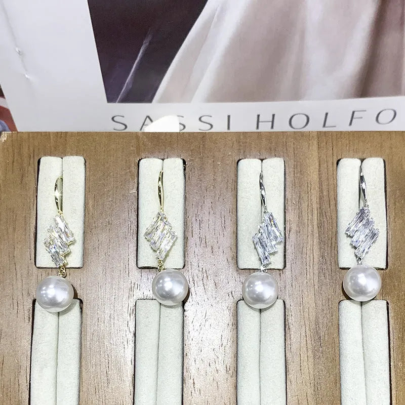French micro inlaid diamond pearl hook earrings in gold finish