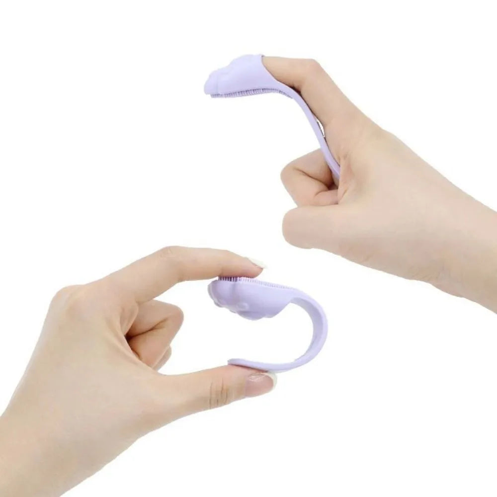 Silicone finger toothbrush for pets in pink, purple and yellow colours
