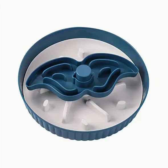 A rotating plastic pet feeding game board with an anti-choke pad and a detachable silicone licking mat in a windmill pattern.
