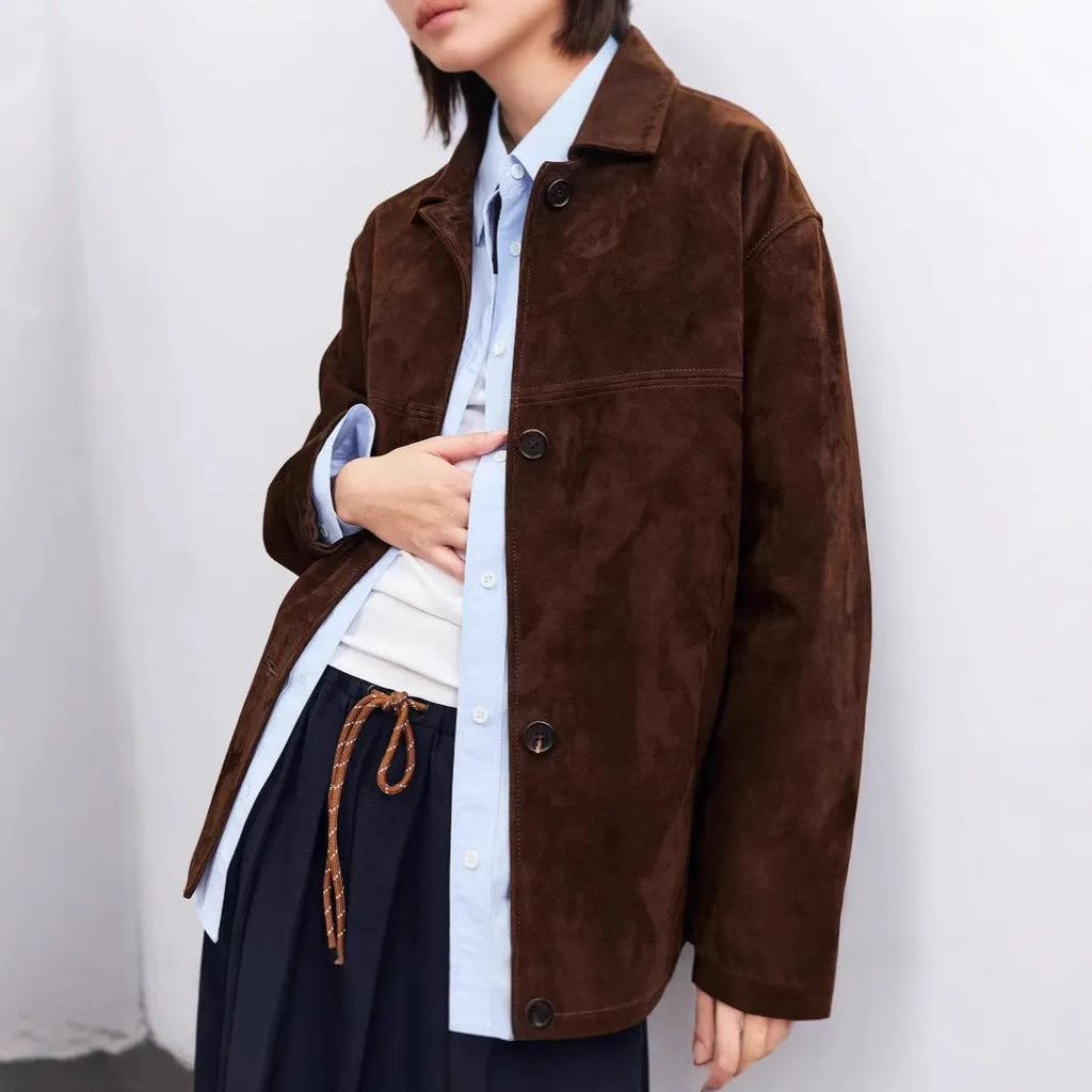 Loose retro-style caramel mocha cashmere coat with Peter Pan collar and leather stitching details