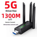 Black USB Wi-Fi network transmitter dongle with four external antennas.