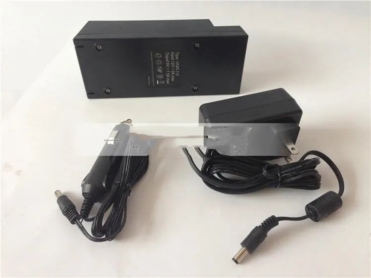 GKL112 model 220v car charger unit with US plug, shown with scale indicating 50g weight.
