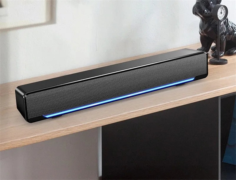 KH V196 plastic 2.0 computer speakers in black with trapezoidal mesh design and breathing light