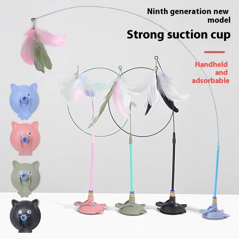 Cat teaser toy with suction cup holder, long brush handle, and bell attachment