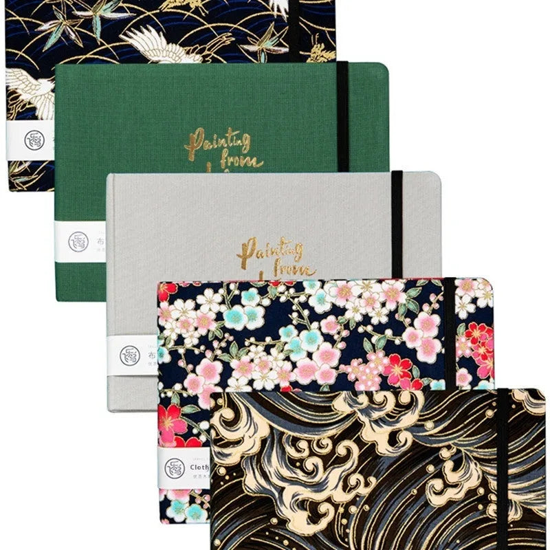 Feiluniao handmade watercolour notebook with fabric cover showing thematic design options