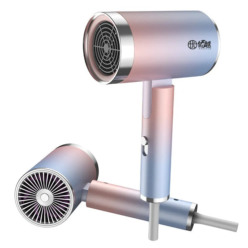 Foldable negative ion hair dryer in emerald green colour with collapsed handle showing compact design