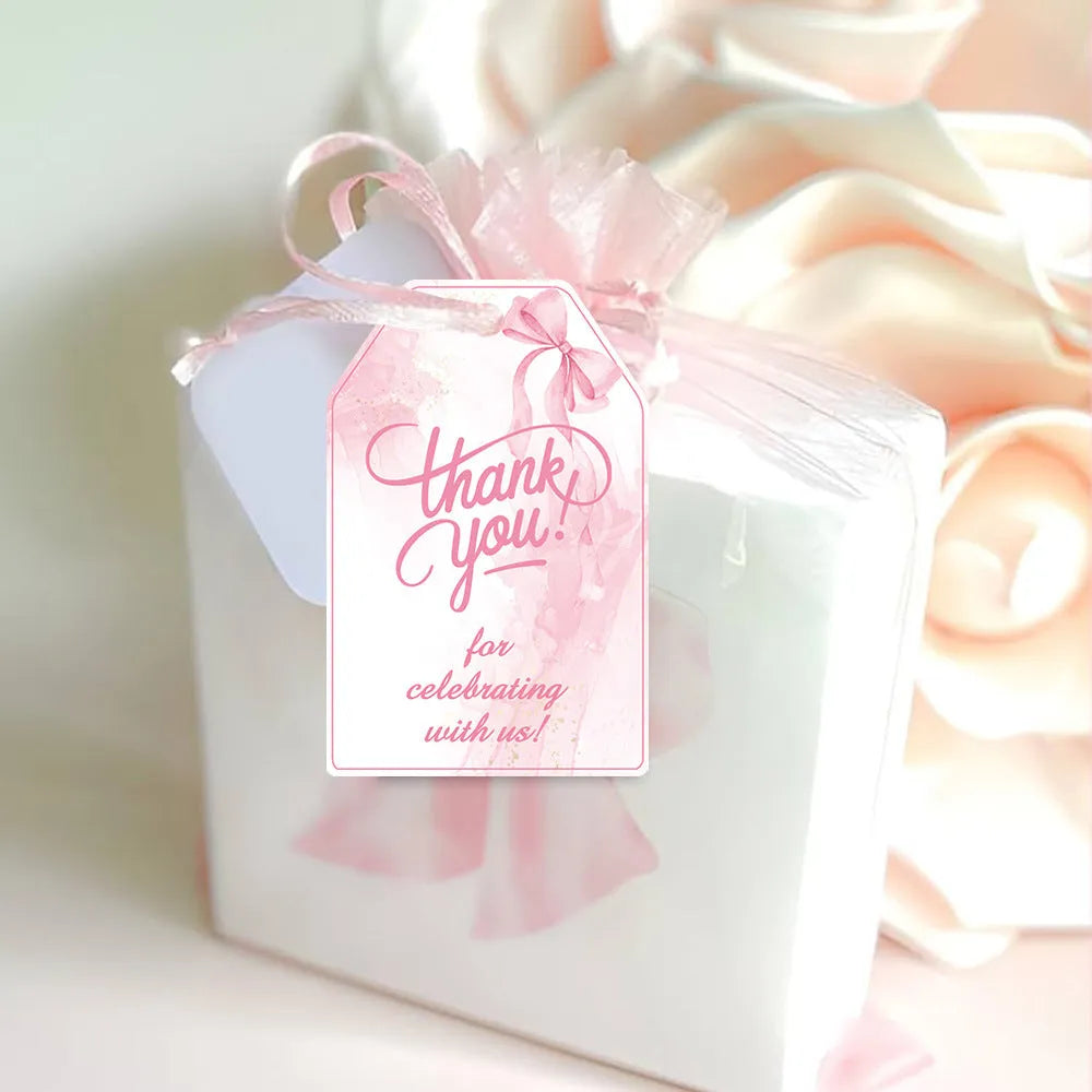 Three styles of bowknot-themed paper gift tags with natural hemp rope for birthday parties