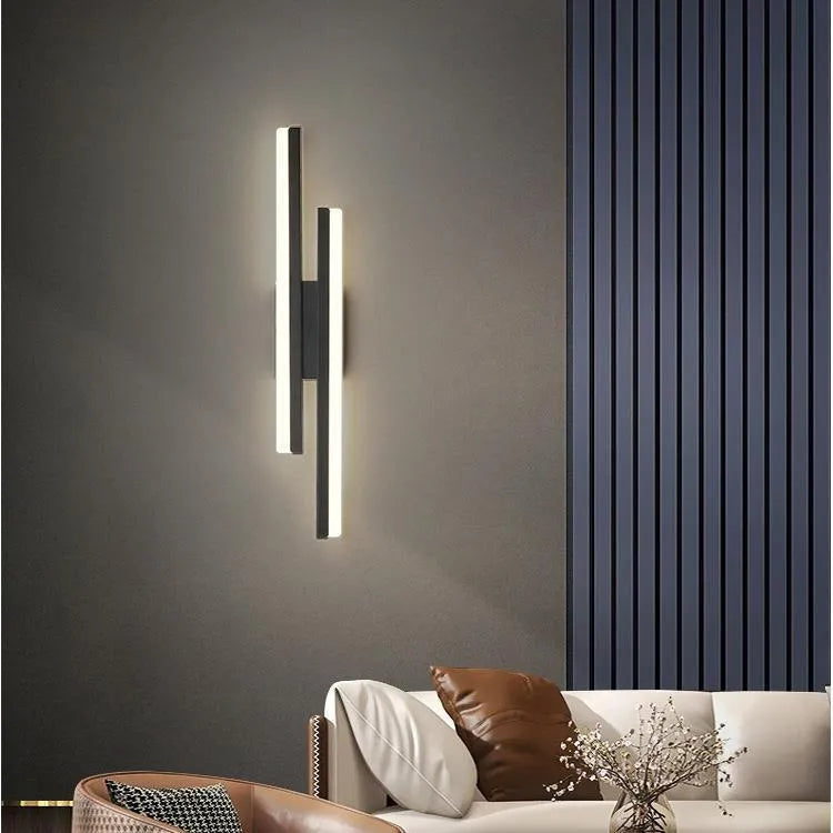 Scandinavian minimalist LED wall light with acrylic lampshade in black or gold finish