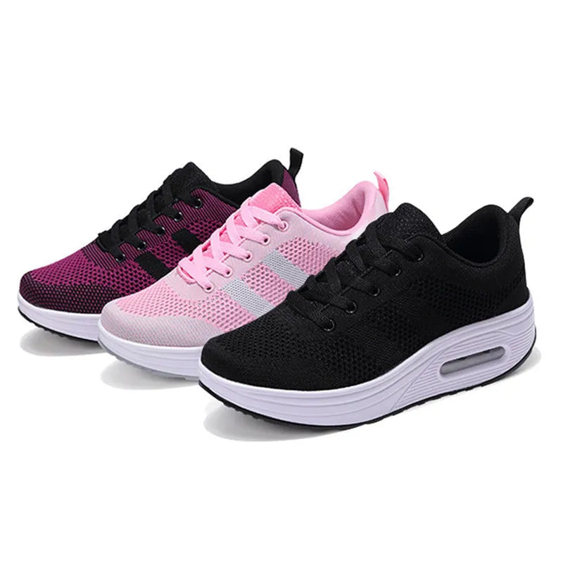 Women's solid colour flyknit platform casual shoes with a vulcanised air cushion sole and T-shaped ribbon.