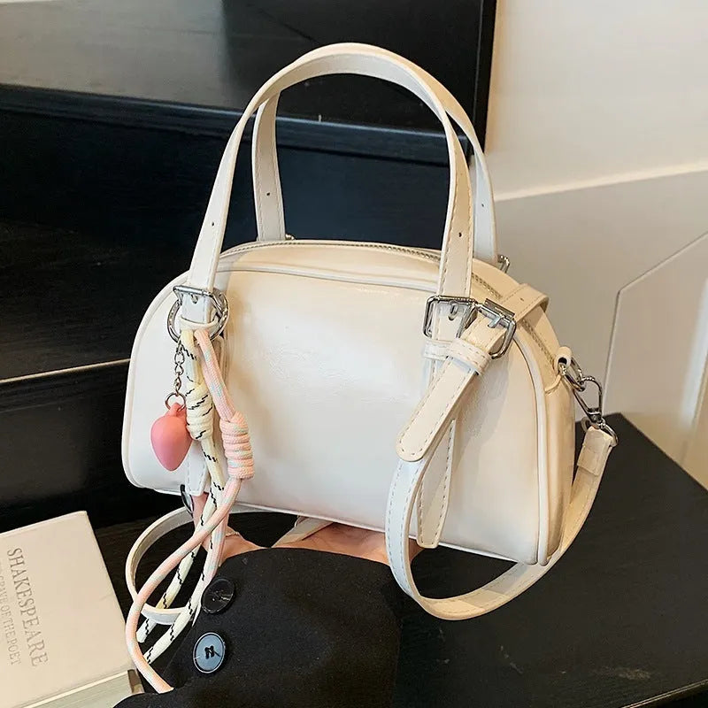 Korean-style square shell shoulder bag in soft PU leather with optional pendant decoration