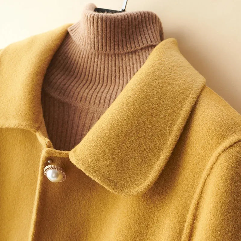 Women's double-faced wool coat with doll collar and pearl buckle in medium length