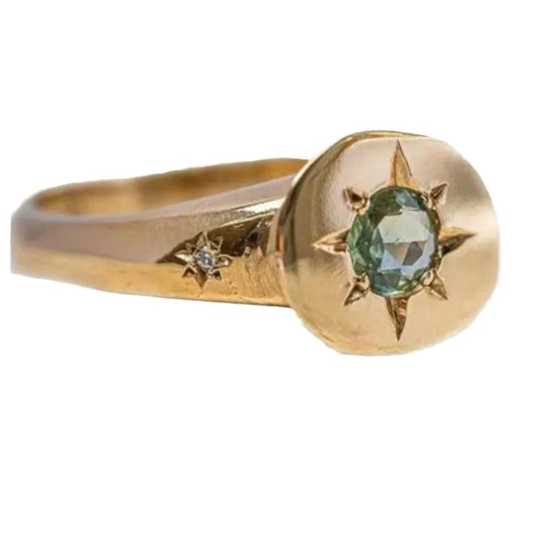 Gold-colour adjustable ring with a micro-inlaid oval star design on a zinc alloy band.