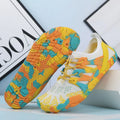 Unisex quick-drying mesh wading shoes with lace-up front and non-slip rubber sole.