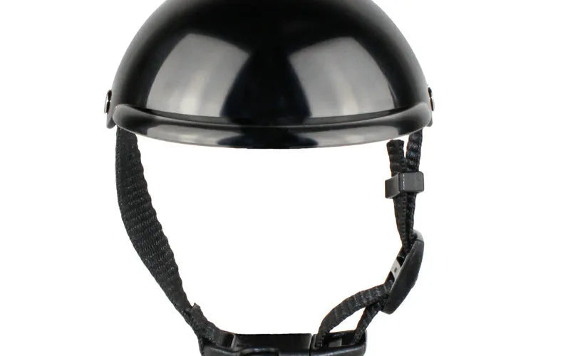 Black pet motorcycle helmet with adjustable strap for dogs and cats on white background