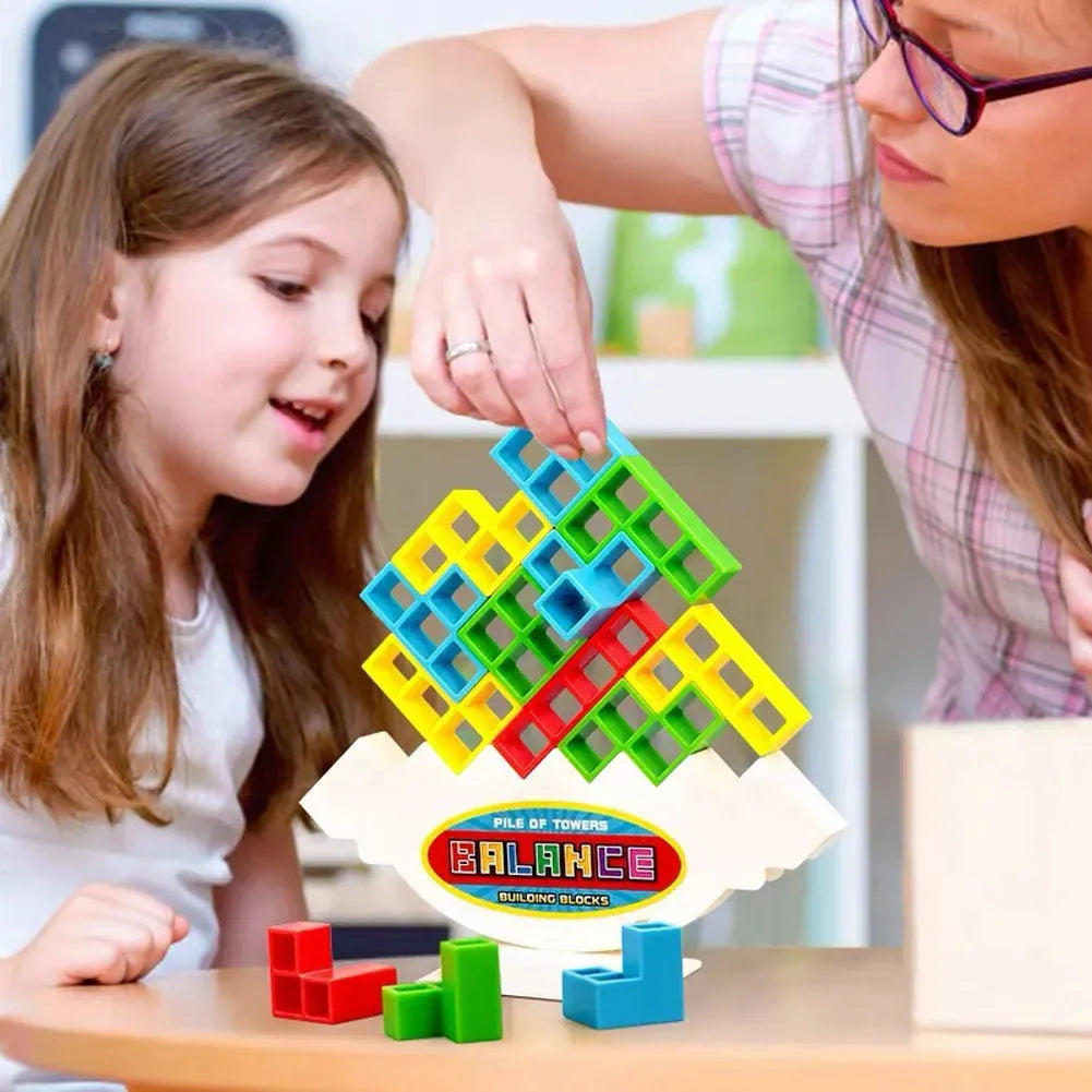 16-piece plastic balance stacking blocks with chassis and base on a table