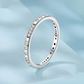 Moss Password I Love You silver-toned ring with oxidised black finish on a hand
