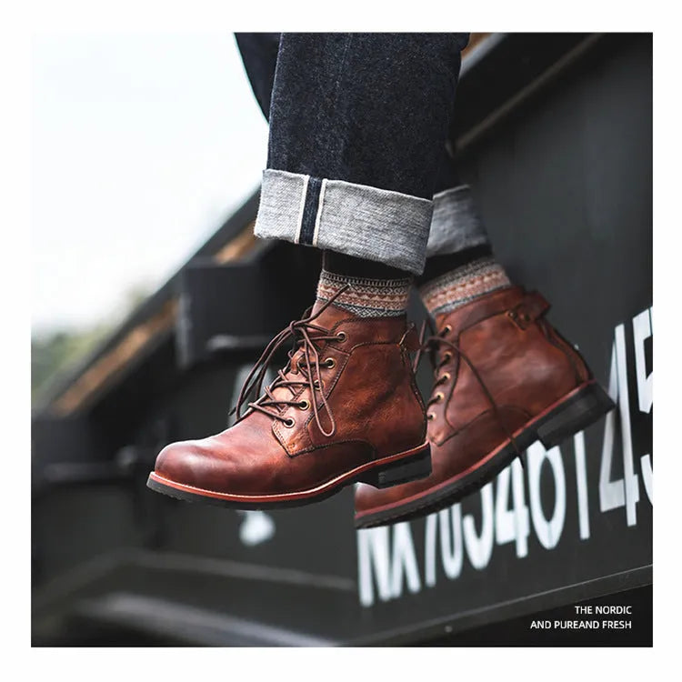 Men's black military Martin boots with rubber sole and lace-up closure on a work site