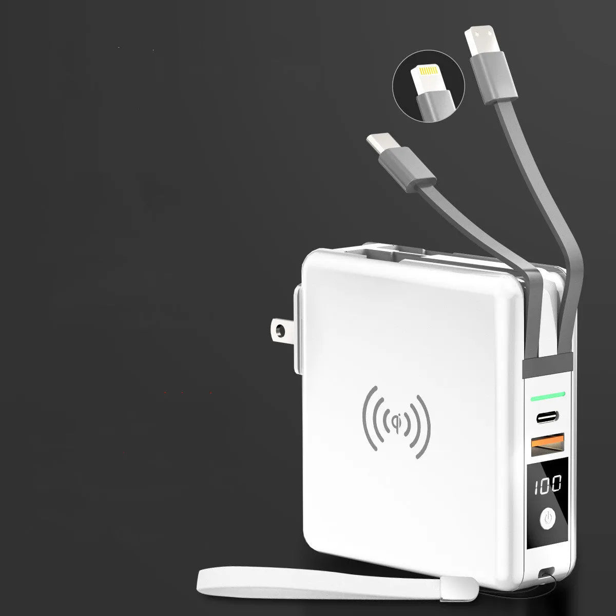 Super Qi wireless power bank in black with folding plug extended and four international adapter heads.