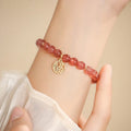 Strawberry quartz blessing card bracelet with clear glass and red gemstones