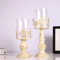 Strongwell iron candle holder cube stand with birdcage design, large 37cm, on a table