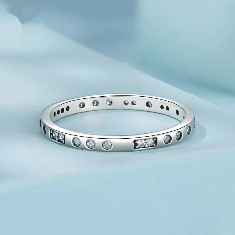 Moss Password I Love You silver-toned ring with oxidised black finish on a hand