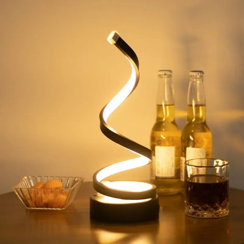 USB powered spiral LED desk lamp in black, compact adjustable design for desk use