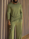 Men's green casual polyester top and pants matching set showing regular fit design