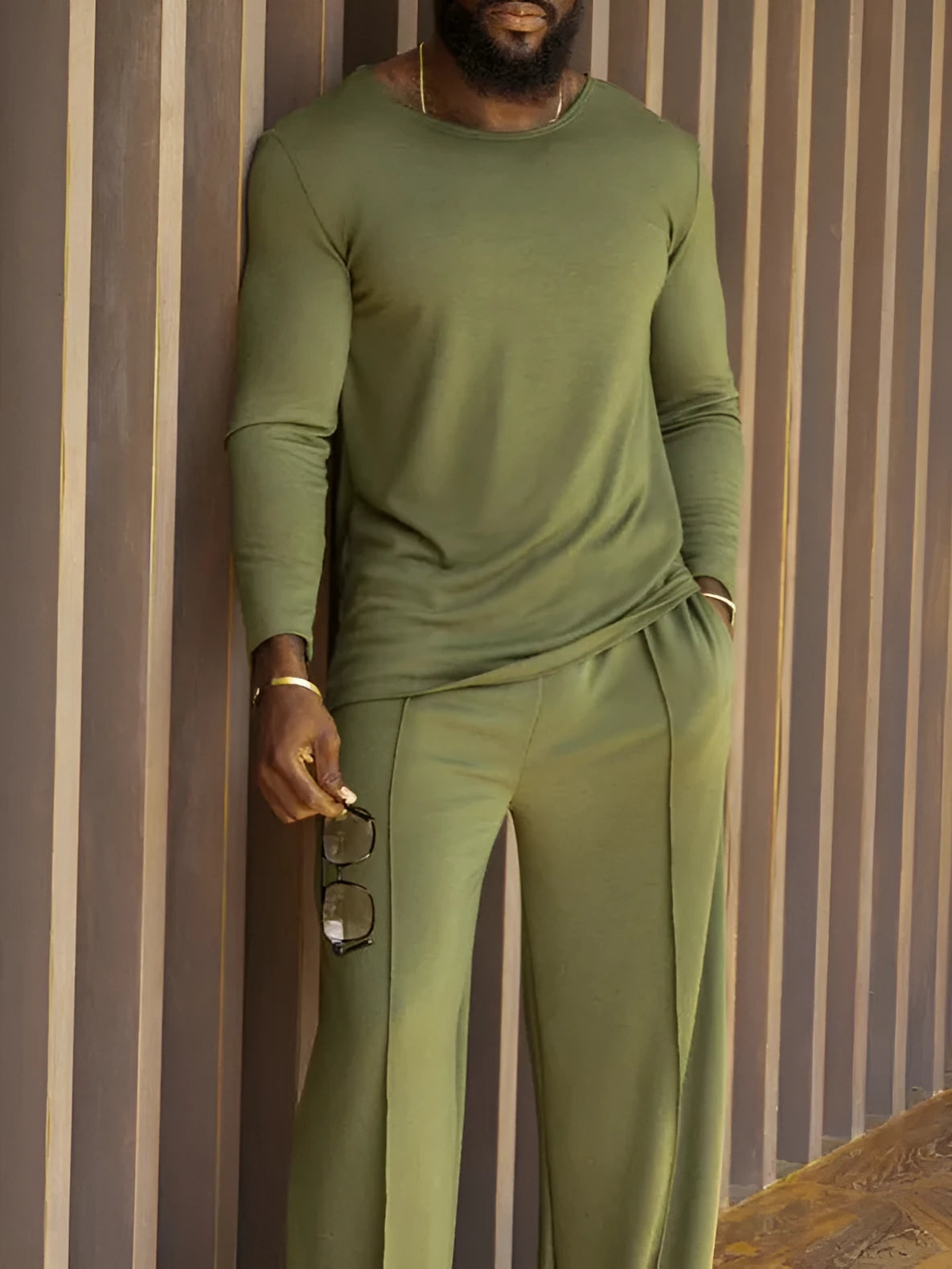 Men's green casual polyester top and pants matching set showing regular fit design