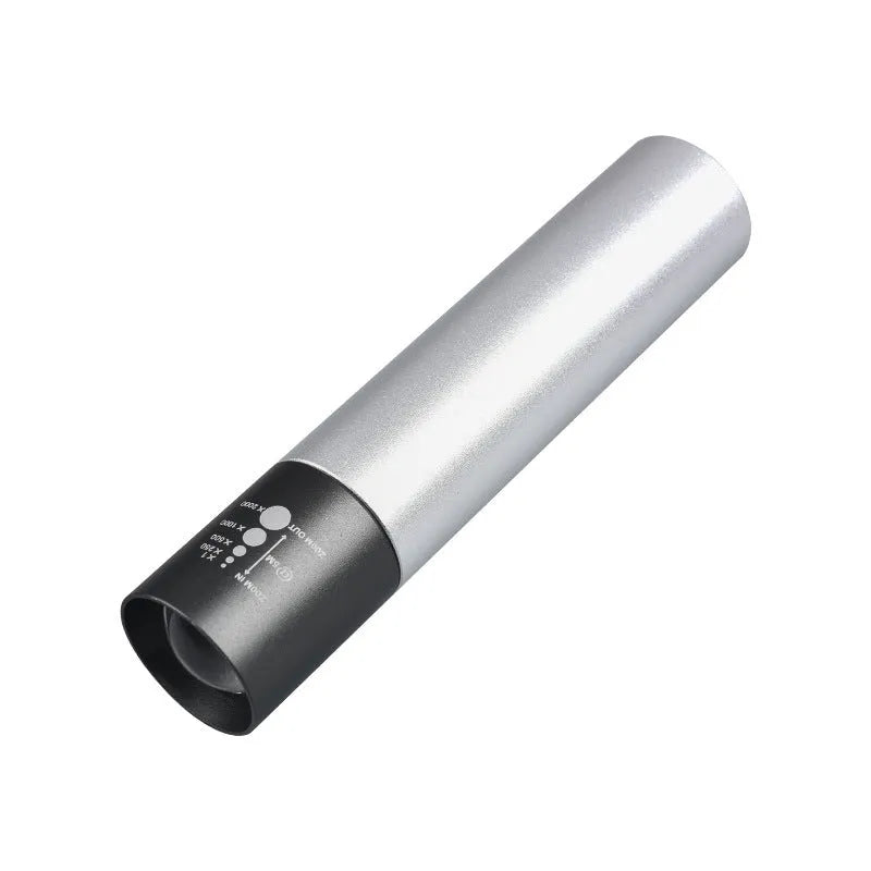 Black and silver aluminium red light therapy mosquito repellent lamp with USB charging port.