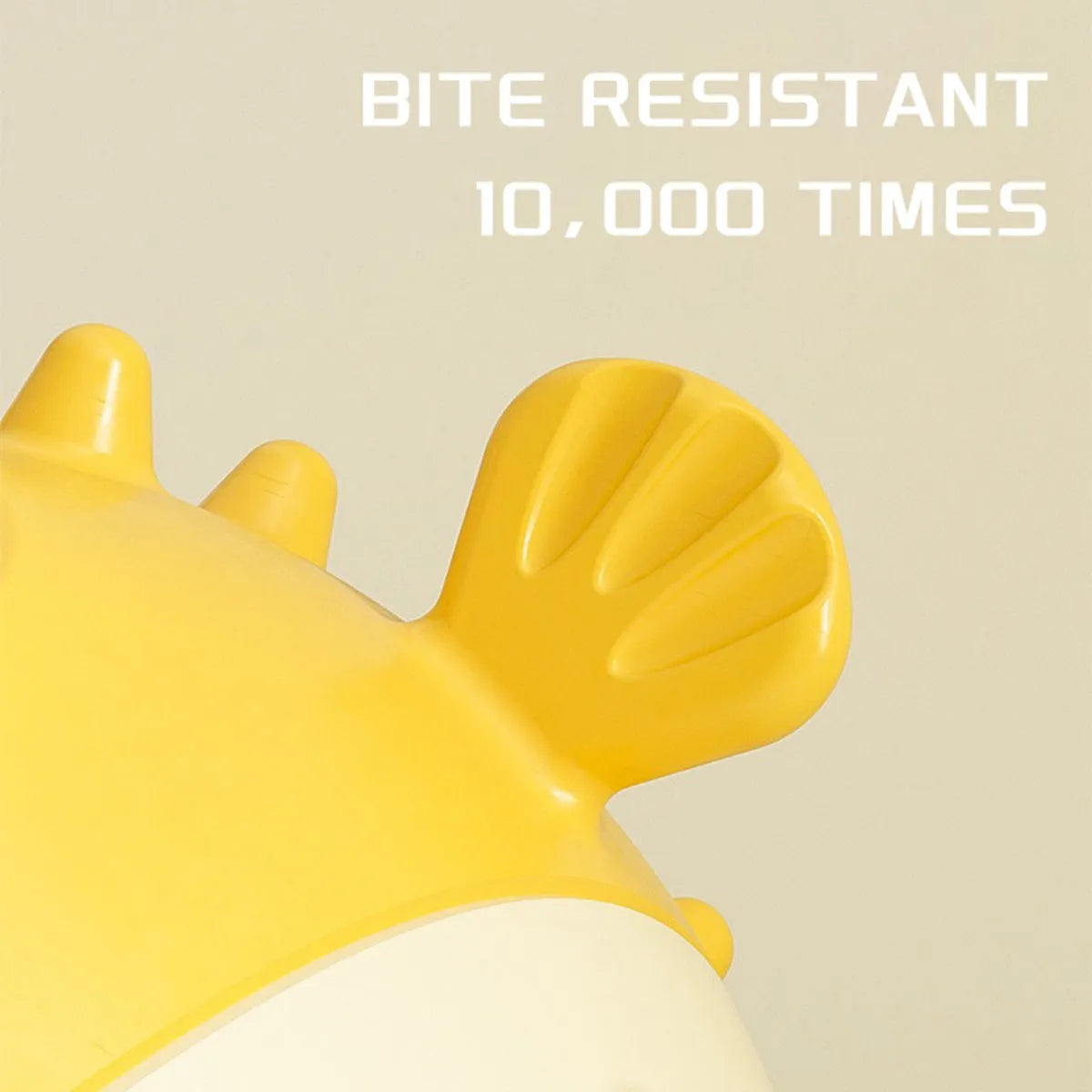 Yellow vinyl fish-shaped dog chew toy with textured surface for teeth cleaning.