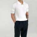 Men's cotton blend solid colour loose fit polo shirt in white with half sleeves