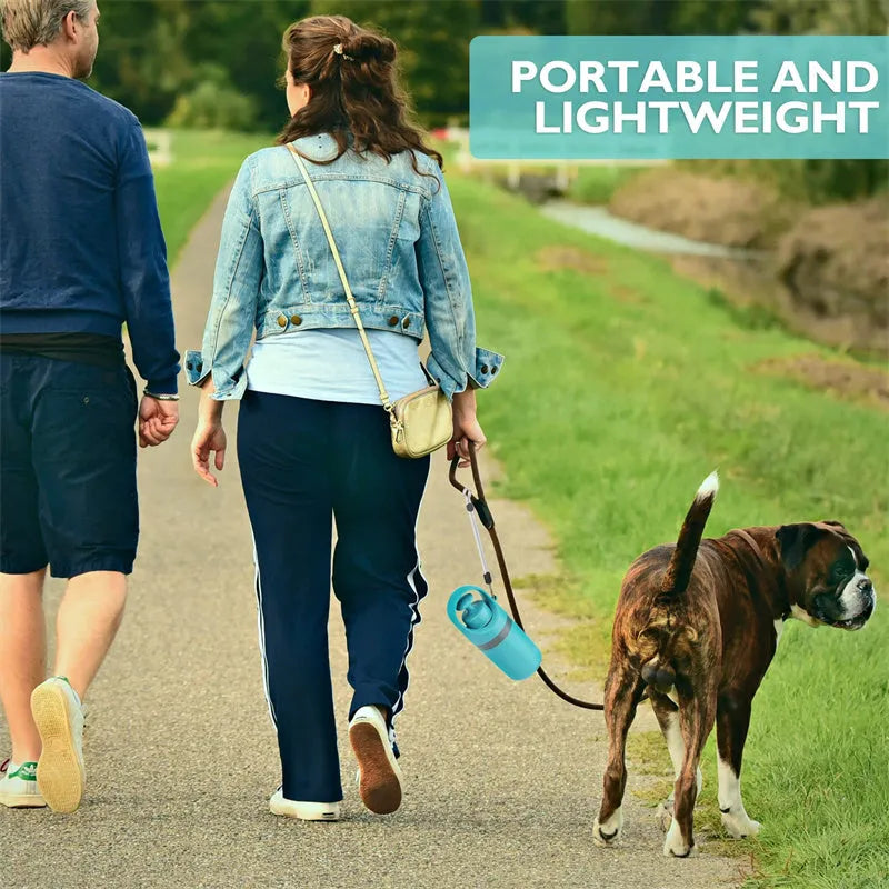 Blue portable dog pooper scooper with built-in bag dispenser and eight-claw shovel.