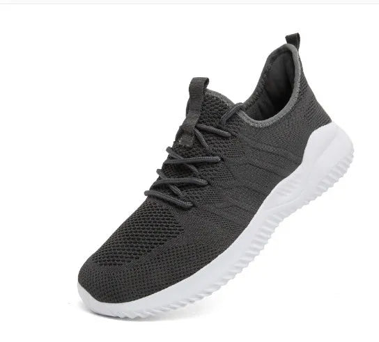 Men's black and white lace-up casual sneaker with mesh upper on a PVC sole.