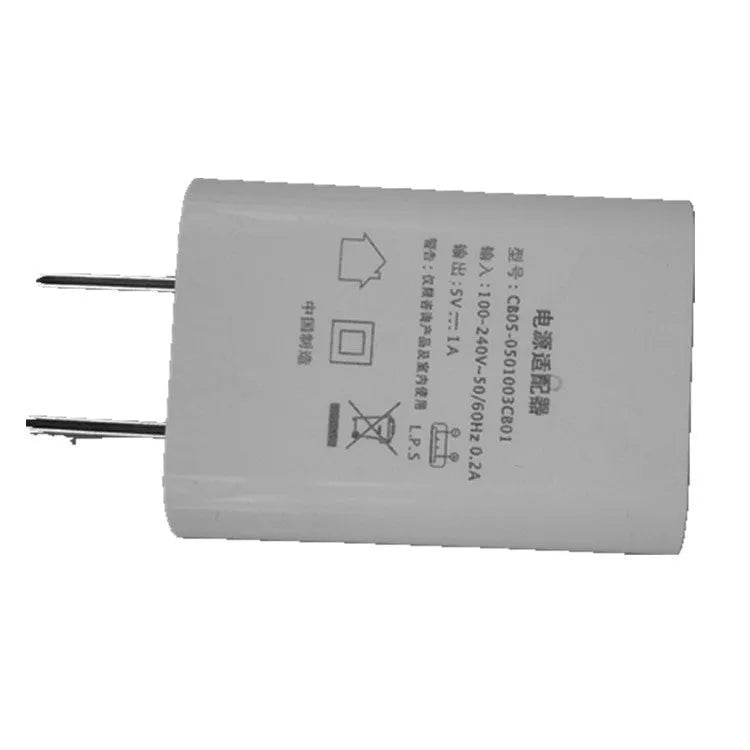 Compact thin white 5V 1A USB power adapter with CE and FCC marks.