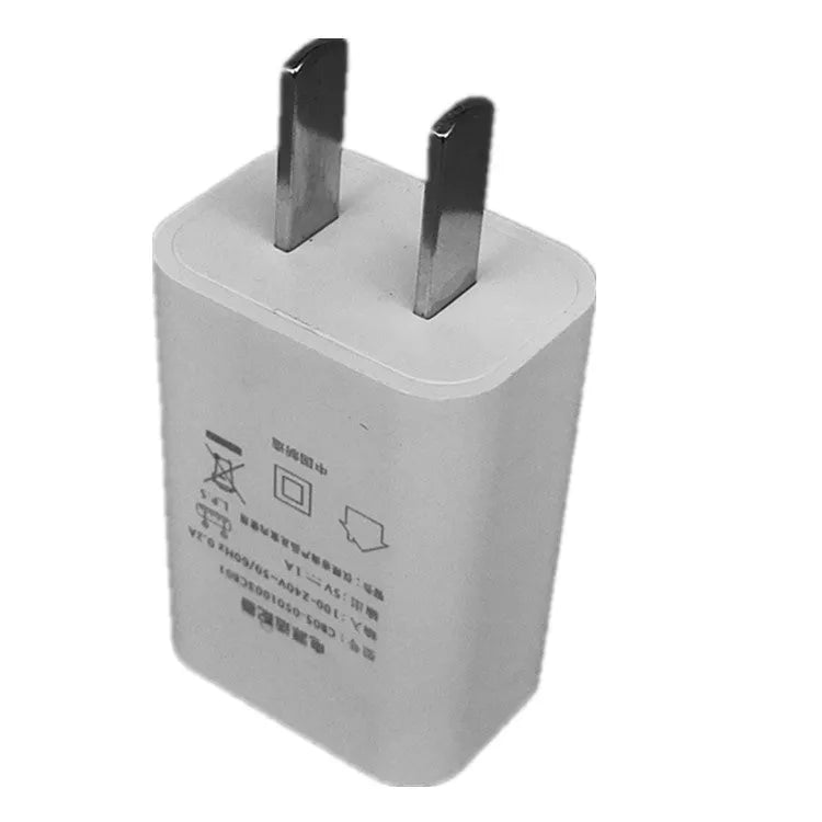 Compact thin white 5V 1A USB power adapter with CE and FCC marks.