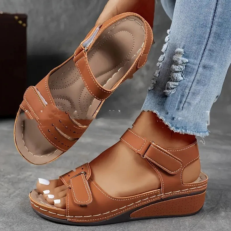 Beige plus size strap sandals with a thick composite sole and adjustable Velcro fastening on a white background