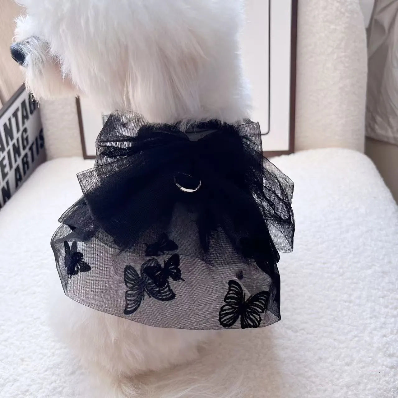 Black gauze princess tulle skirt for a small dog or cat on a mannequin.