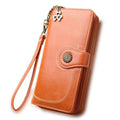Split leather long wallet for women with PU leather, zip-around closure, multiple card slots, black finish.