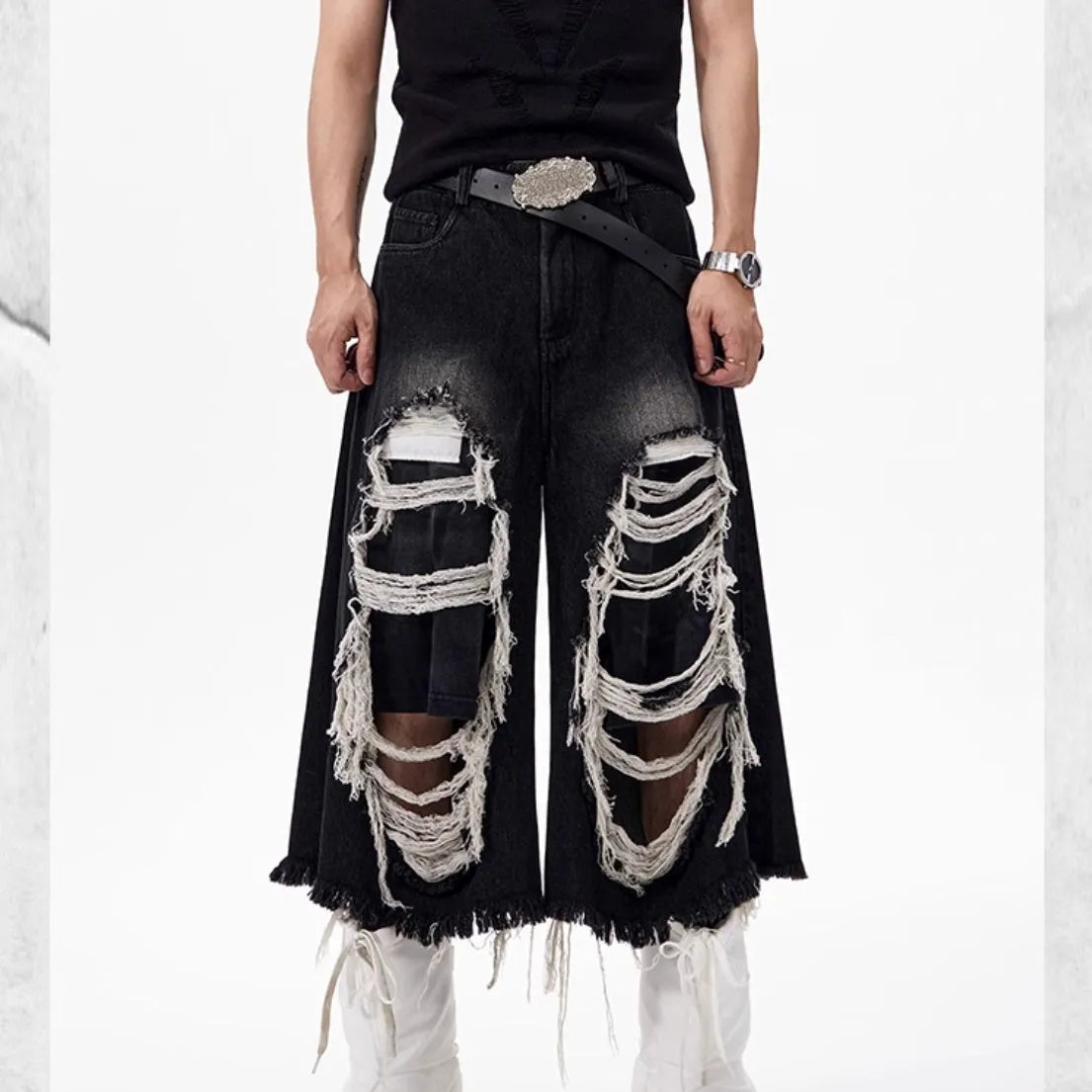 Black women's cropped wide-leg jeans with a mid-high waist and relaxed fit.
