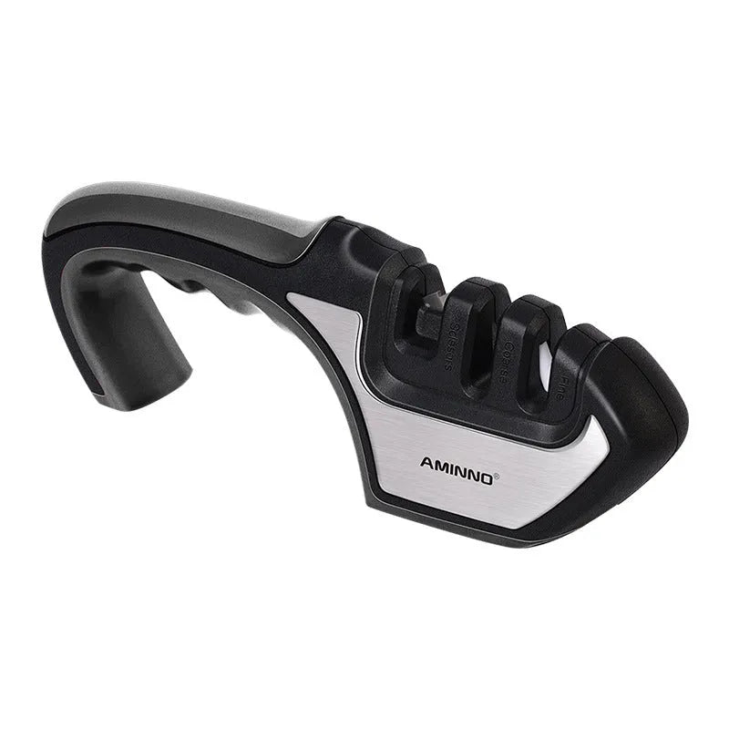 4-in-1 manual kitchen knife sharpener with black and cyan TPR handle, showing sharpening slots.